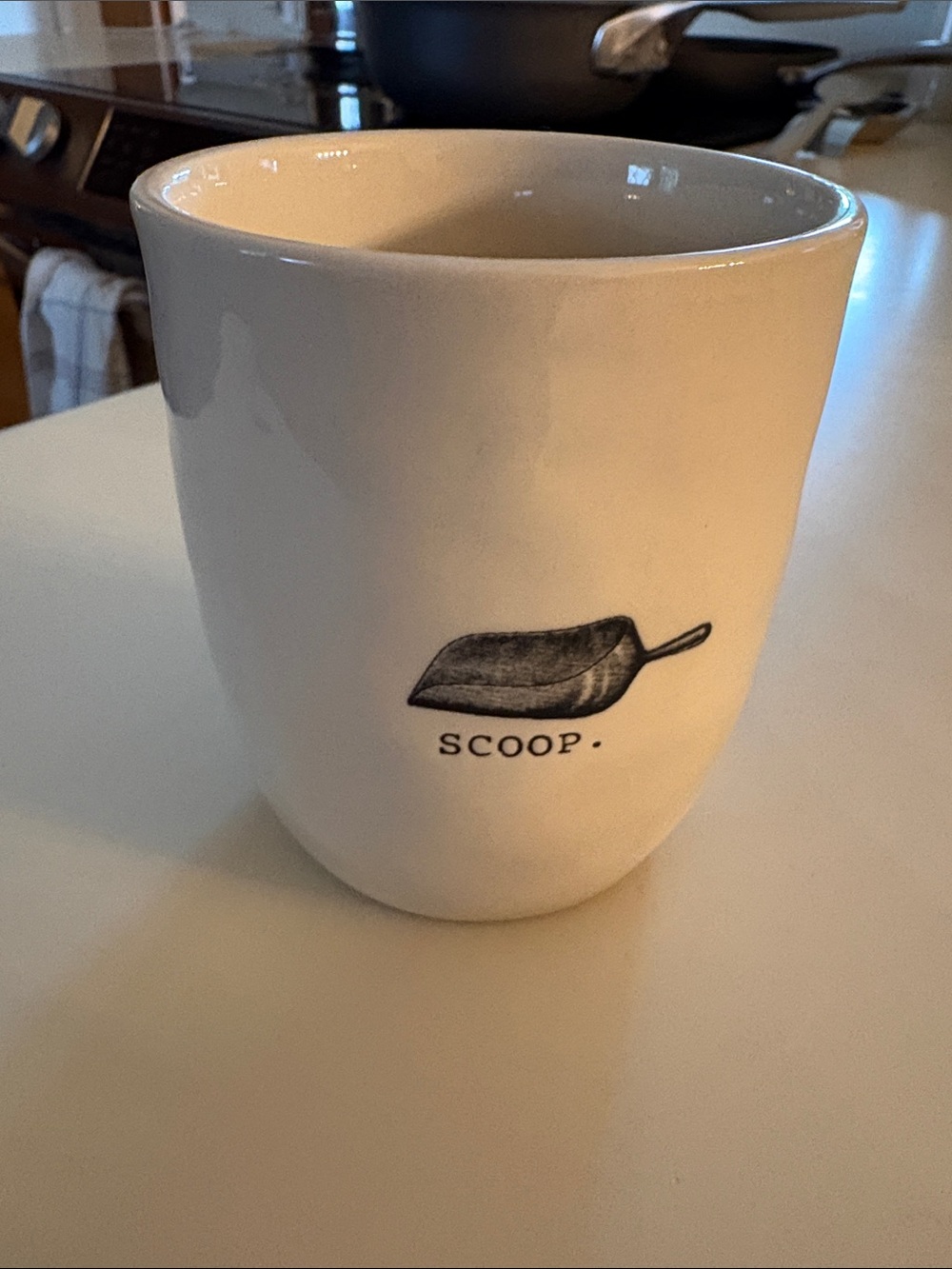 Rae Dunn White Ceramic Mug with Black Leaf and "SCOOP" Print